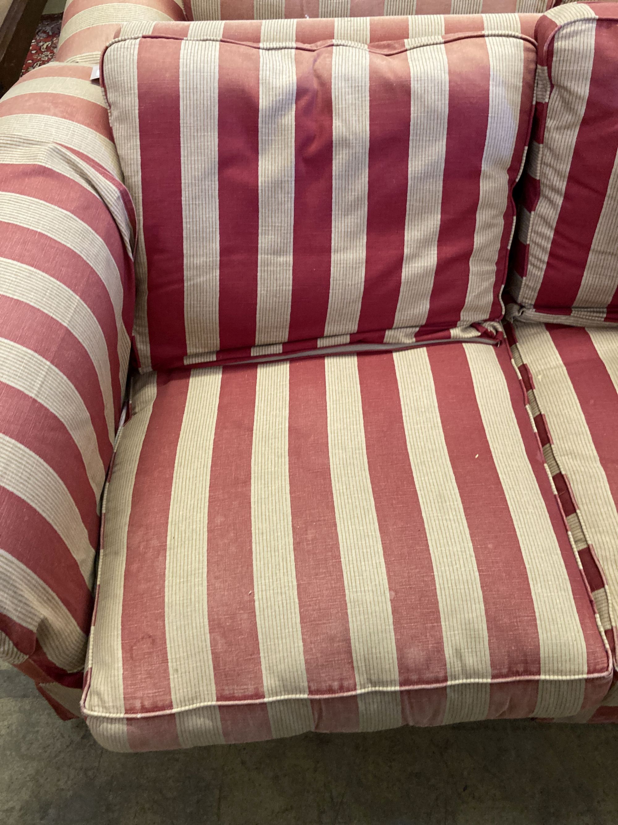 A pair of modern Chesterfied settees with red and cream upholstery (upholstery worn), length 178cm, depth 100cm, height 72cm